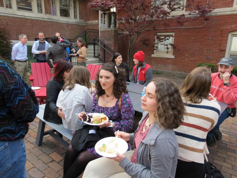 Department members sitting at tables and eating