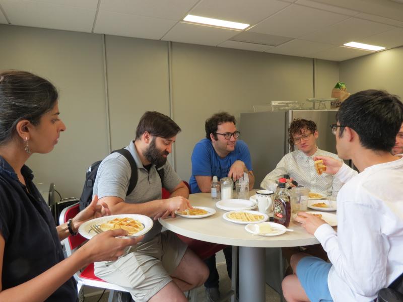 Department members enjoying waffles