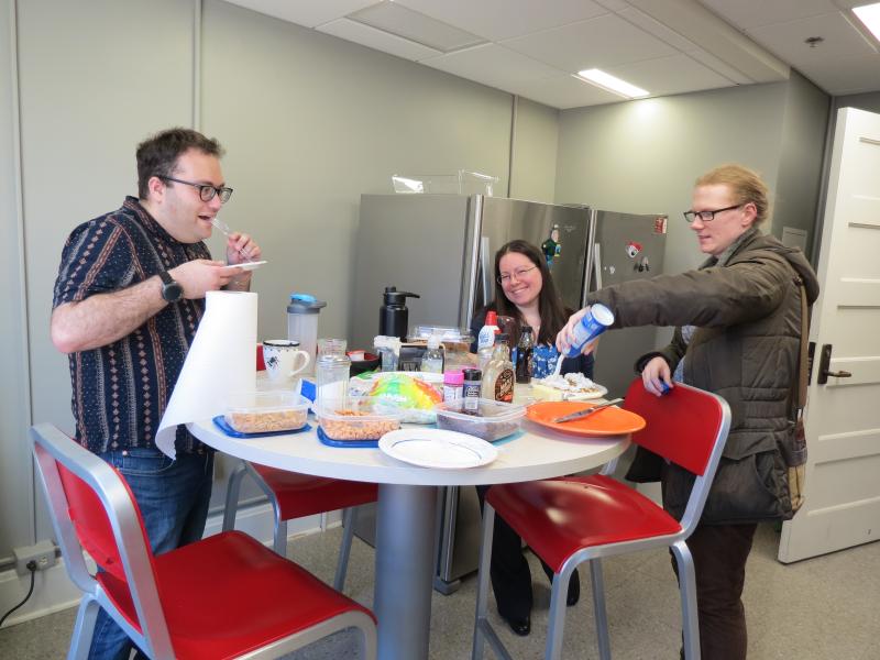 Students and staff eating waffles