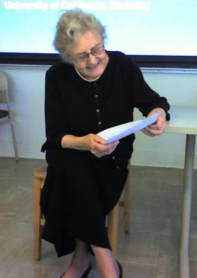 Ilse reading infront of class.