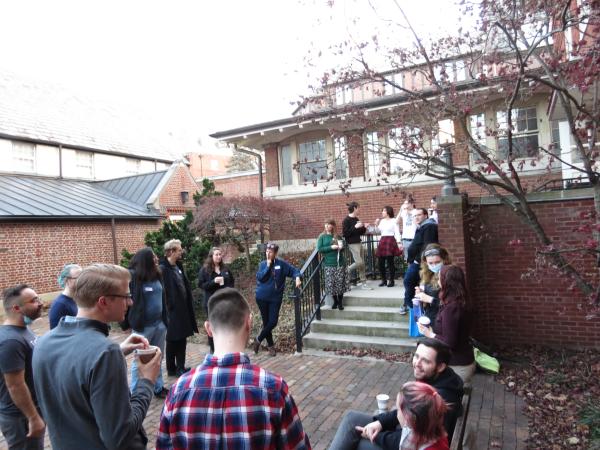 People standing outside in the courtyard