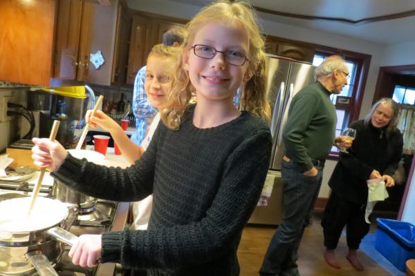 Maryam Harmon makes candy at the holiday party