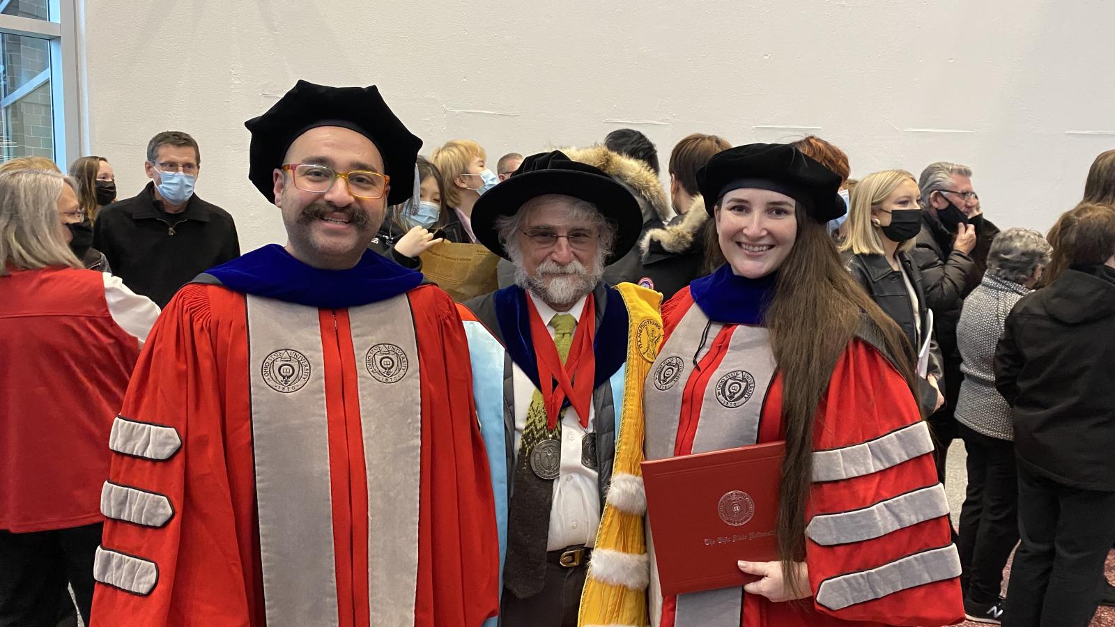 New grads Shuan Karim and Carly Dickerson with their advisor, Brian Joseph