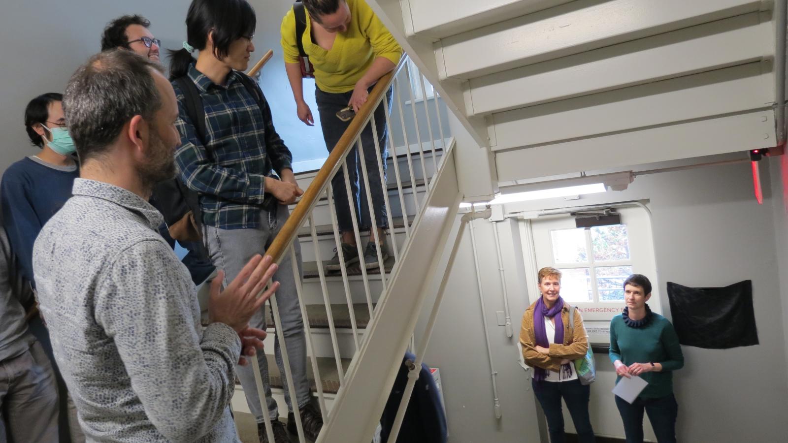 Department members in the stairwell for the unveiling