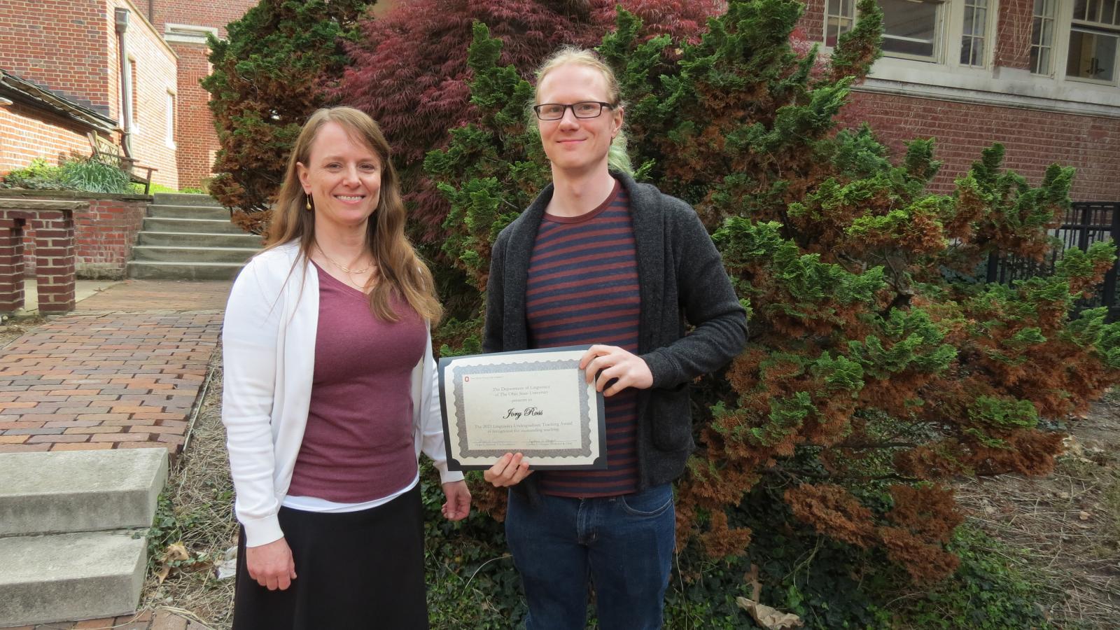 Jory Ross with Hope Dawson after winning the teaching award